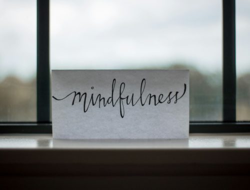 mindfulness printed paper near window